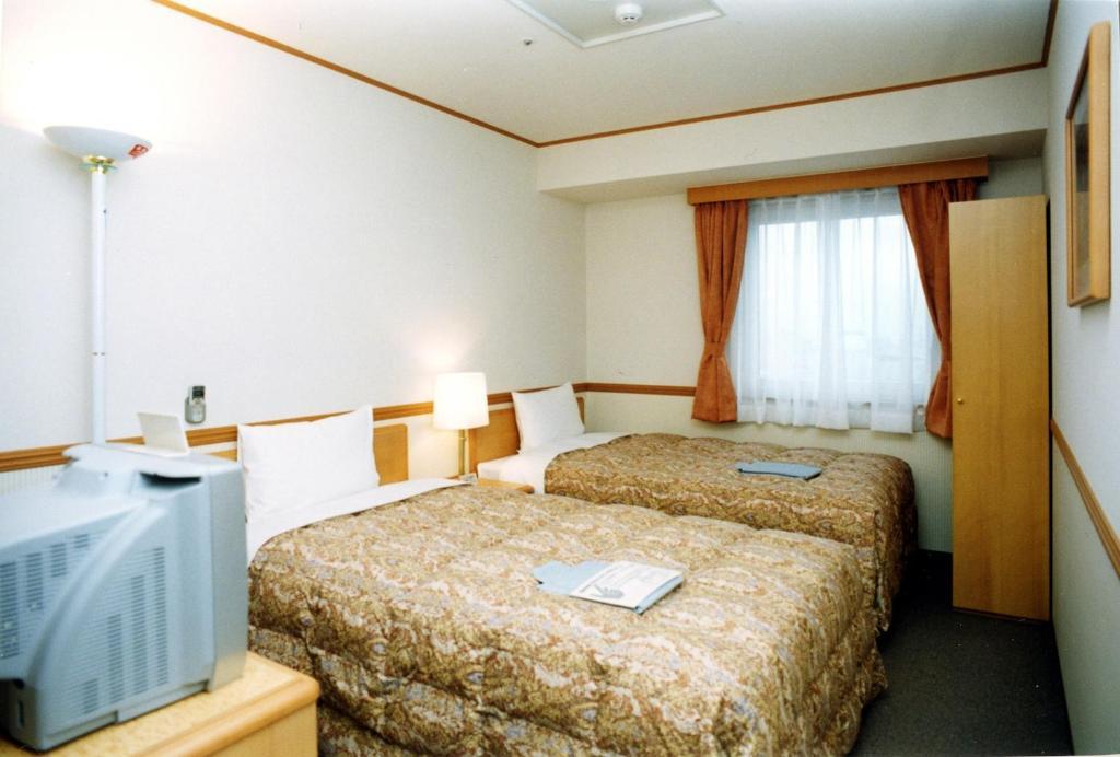 Toyoko Inn Niigata Ekimae Δωμάτιο φωτογραφία